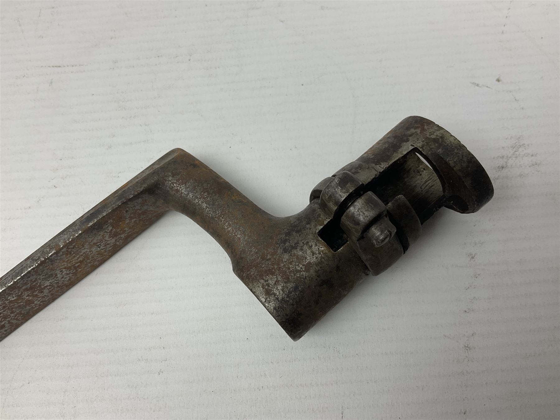 Early 19th century British Brown Bess musket rifle socket bayonet with zigzag fitting stamped D71 and triangular blade stamped 270 L55cm overall; and two other 19th century socket bayonets; no scabbards (3)