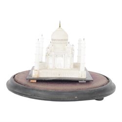 Early 20th century carved alabaster model of the Taj Mahal, early 20th century, under glass dome, raised on a velvet-lined and ebonised plinth, H26cm