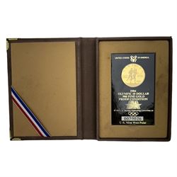 United States of America 1984 'Olympic' gold proof ten dollars coin, in card holder with presentation case