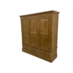 Solid pine triple wardrobe with three drawers