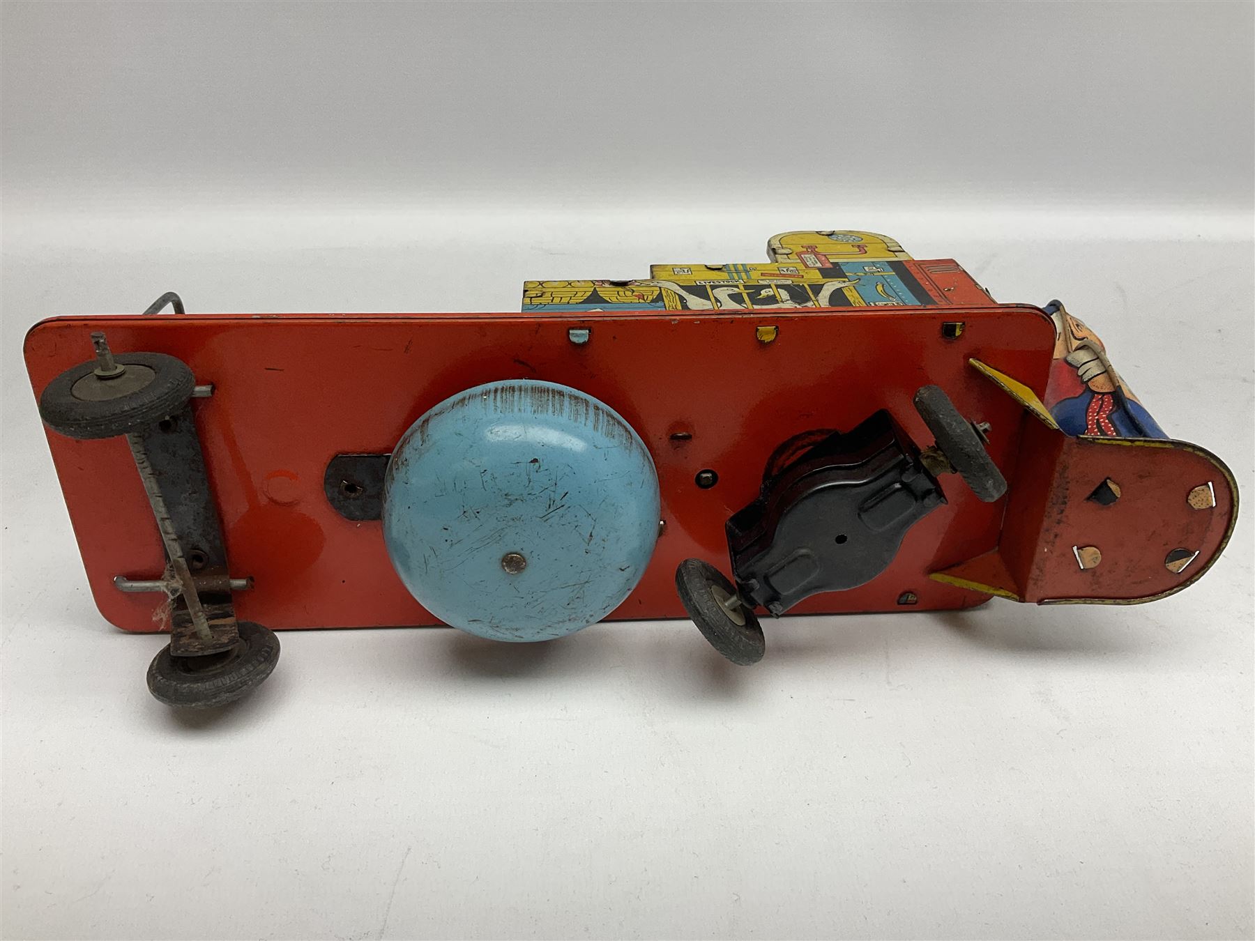 Wells Brimtoy 'Mr. Porter and his Truck' clockwork lithographed tin-plate mechanical toy L30.5cm