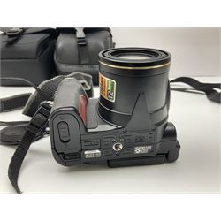 Nikon Coolpix 8700 camera body, serial no 3220838, with Zoom Nikkor Ed 8.9-71.2mm 1:2.8-4.2 lens, together with Canon digital video camcorder and other digital cameras and camera equipment