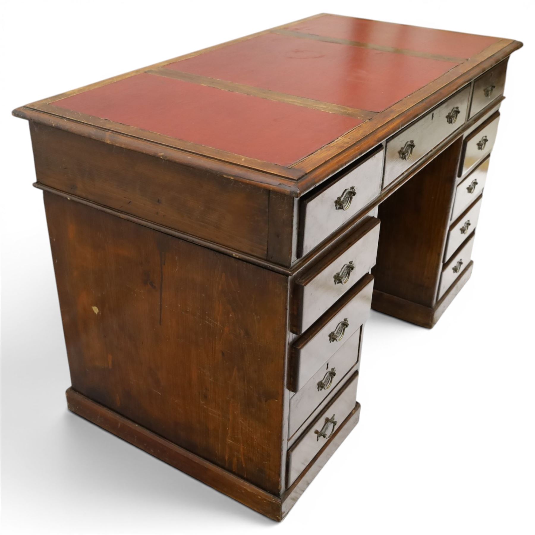 Late 19th century twin-pedestal desk, red leather inset top over an assortment of eleven drawers, on plinth base (W126cm D65cm H77cm); with Edwardian oak framed Captains swivel desk chair, of tub shaped form with spindle back supports (W60cm H89cm)