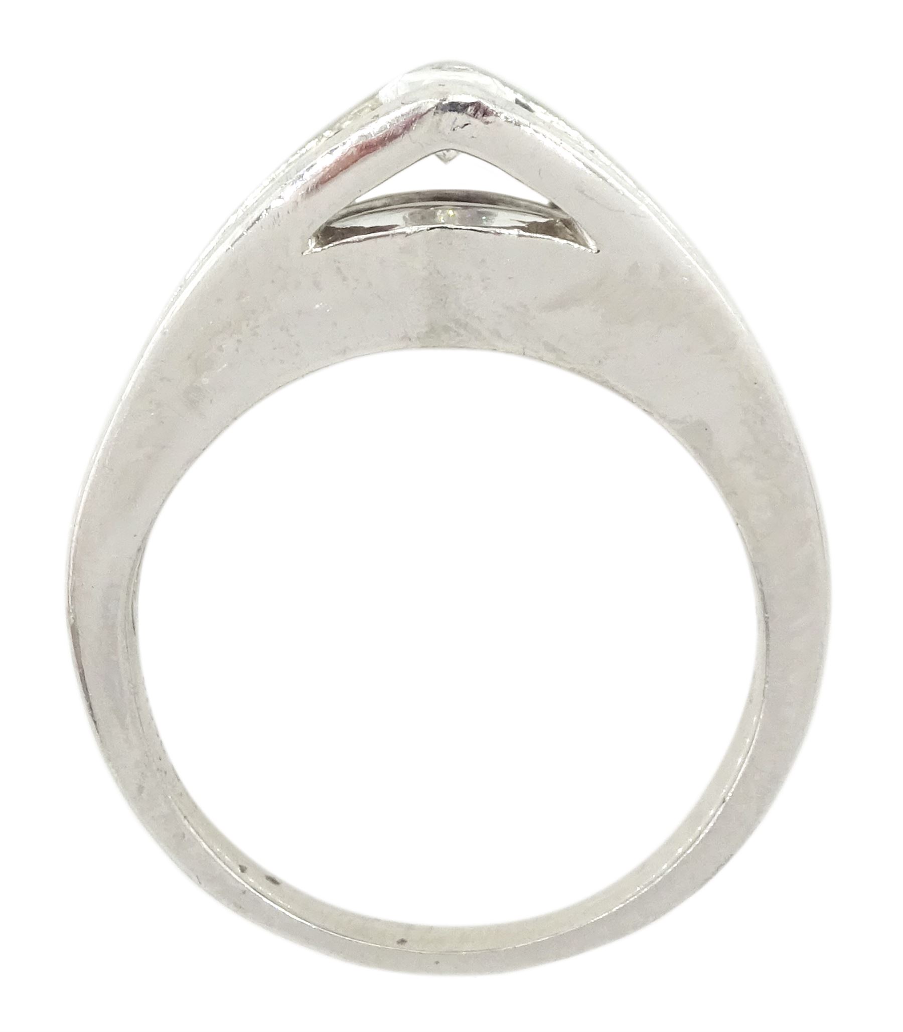 Platinum diamond ring, the marquise cut diamond of approx 0.45 carat, raised above channel set, princess and baguette cut diamond band, stamped PT950, total diamond weight approx 1.00 carat