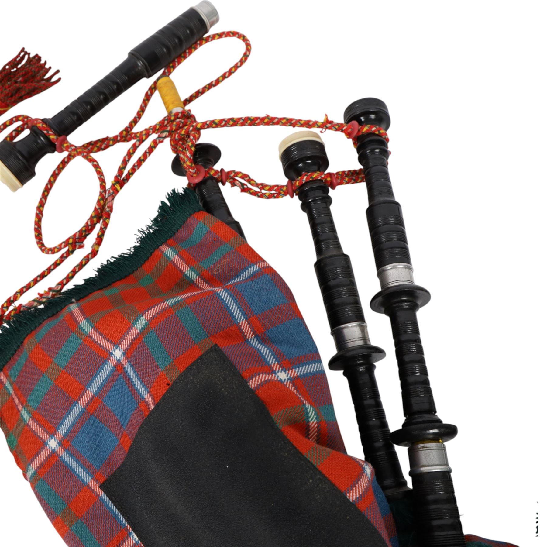 Set of ebonised wooden bagpipes, with new bag in Cameron of Lochiel tartan, contained in leather suitcase with initials PAJ to cover