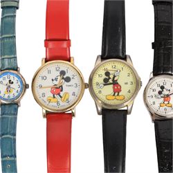 Six Disney Mickey/Minnie Mouse watches, two Mickey Mouse ring watches and a clip on stop watch
