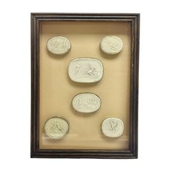 Set of six 19th century Grand Tour plaster intaglios, each depicting classical figures, frame H25cm, W19cm