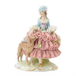 Three Continental lace figures, to include a Sitzendorf example modelled as a dancer with lace skirt, top and cuffs, upon a gilt detailed base, with printed mark beneath, H22cm 