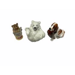 Royal Doulton Spaniel, seated with pheasant in mouth, HN1029, together with a Royal Copenhagen Polar Bear cub, and a Beswick Beatrix Potter Tailor of Gloucester figure. 