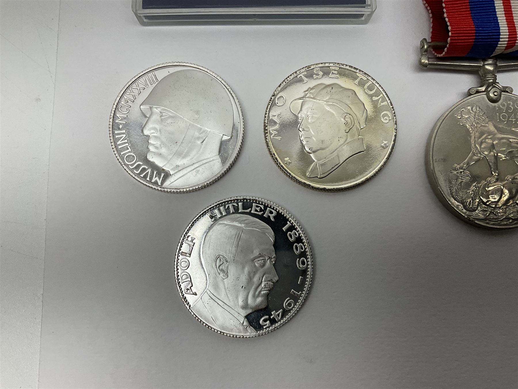 WW2 group of three medals comprising 1939-1945 War Medal, France & Germany Star and 1939-1945 Star; all with ribbons; 1930s Hull Savings Bank silver and enamel presentation fob; three medallions depicting Hitler, Mussolini and Mao Tse Tung; quantity of modern crowns and other coins; and a 6mm Flobert style starting pistol
