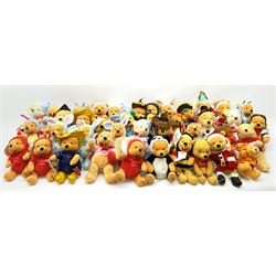 Forty Walt Disney character Pooh bears including Santa, Easter 2000, Raincoat, Snowman, Pirate, Millenium Bug, Bumble Bee, Aviator, Lovebug etc.(some duplicates)