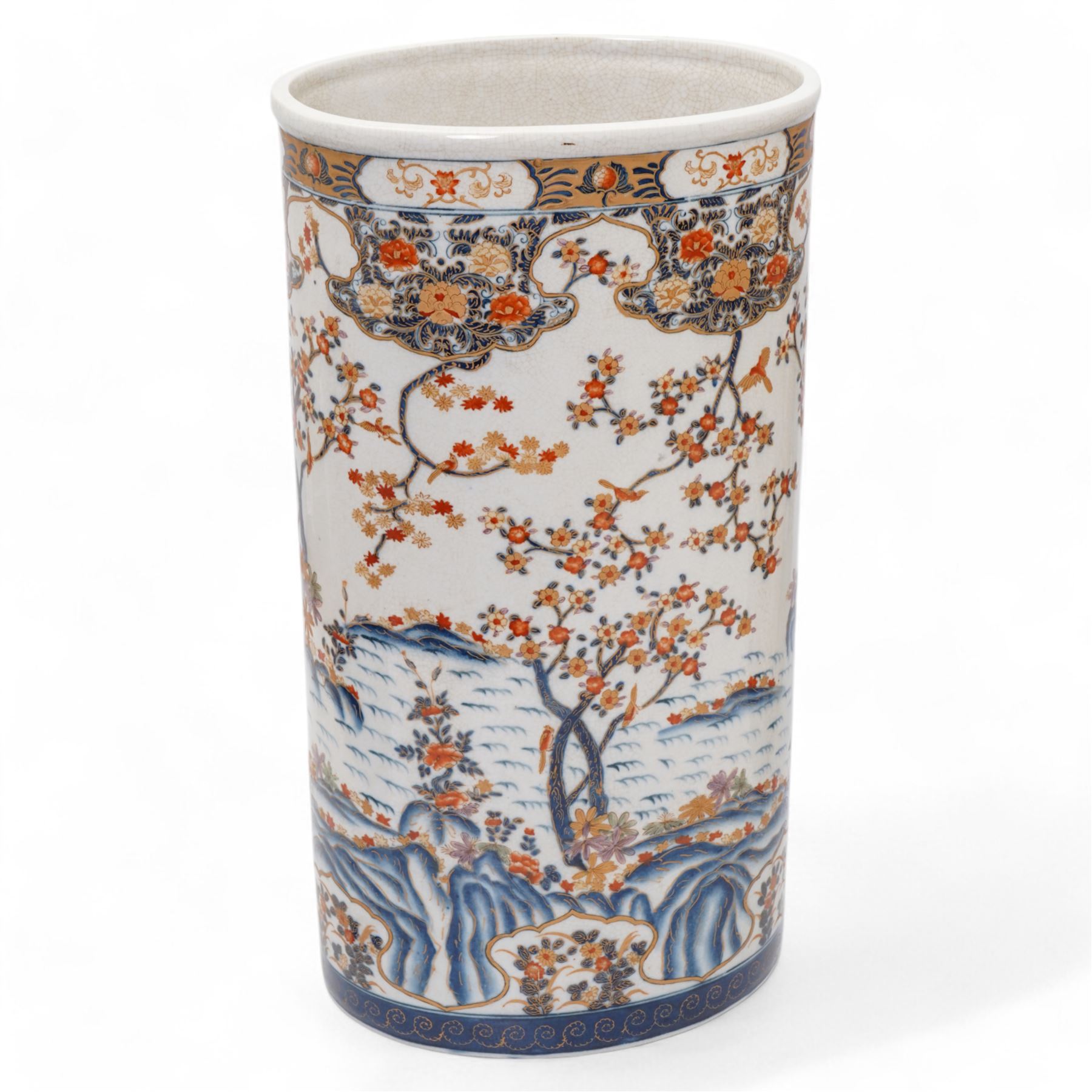 Late 19th/early 20th century Japanese imari charger, decorated with panels of mountains and bamboo, D46cm, and a large imari pattern stick stand, H48cm (2)