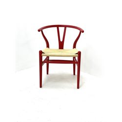 After Hans Wegner - 'Wishbone' style armchair with deep red finish and corded seat 