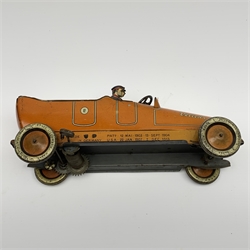 Early 20th century Lehmann clockwork tin-plate open top car with chauffeur, the bonnet inscribed 'Velleda', folding seats and bench seat to the back and integral key, various patent dates up to 1913, L25cm