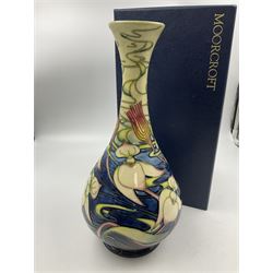 Moorcroft vase, of bottle form, decorated in the Orchid Arabesque pattern by Emma Bossons, circa 2002, H31.5cm, with original box 