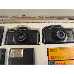 Two Pentax Auto 110 camera bodies and accessories including flashes, winder and lenses, all within two flight cases