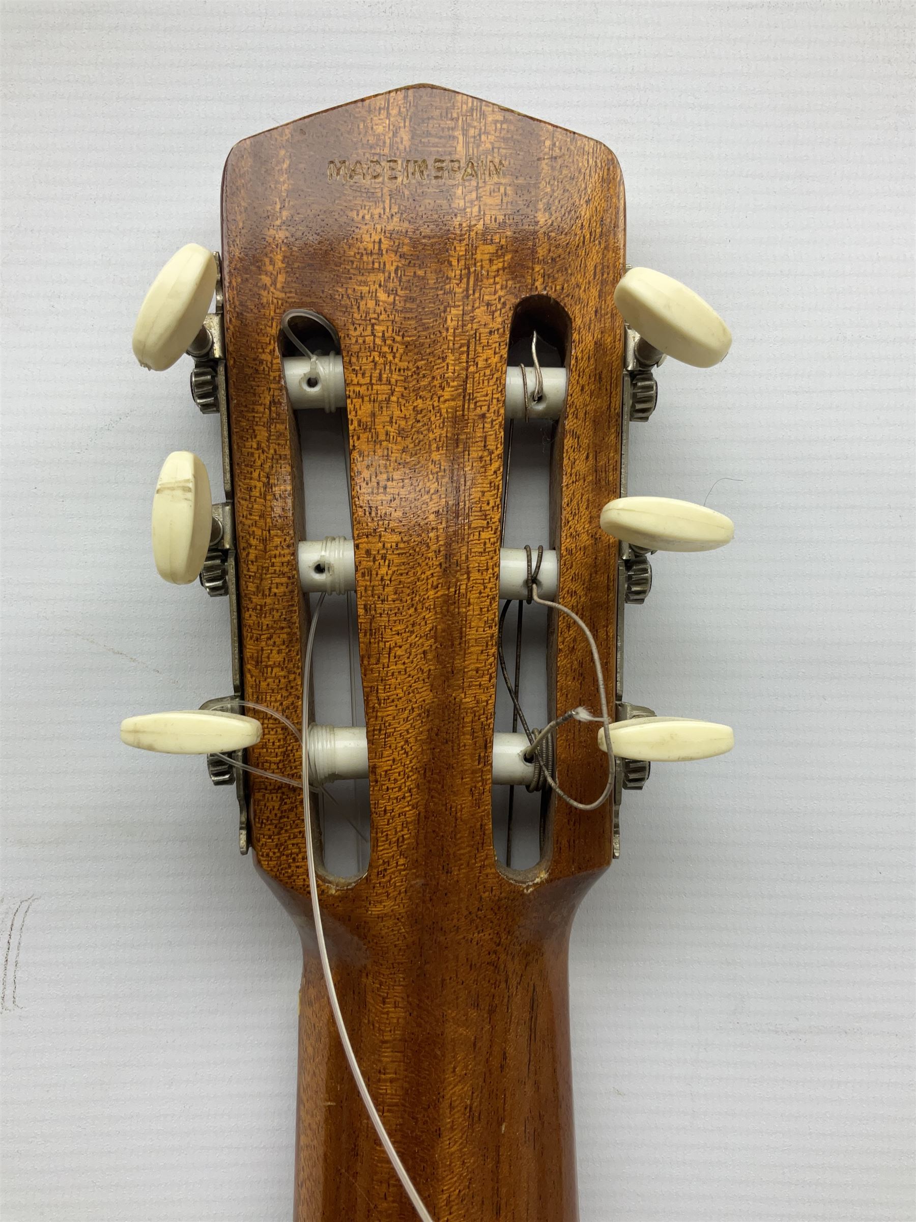 Encore black electric cut-away guitar L96cm; and Spanish Victor Garcia model 187 acoustic guitar, bears label dated 1972 L99cm; each in soft carrying case (2)