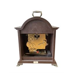 20th century- Hermle 8-day moon phase three train bracket clock, with a brass dial and subsidiary moon dial, floating balance escapement chiming the quarters on 5 gong rods. With an English oak cased Smiths Enfield 8-day striking mantle clock c1950. With pendulum and key.  