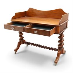 Victorian mahogany washstand with raised three-quarter back, fitted with two frieze drawers with glass handles, raised on spiral turned supports with splayed supports and castors united by barley-twist stretcher