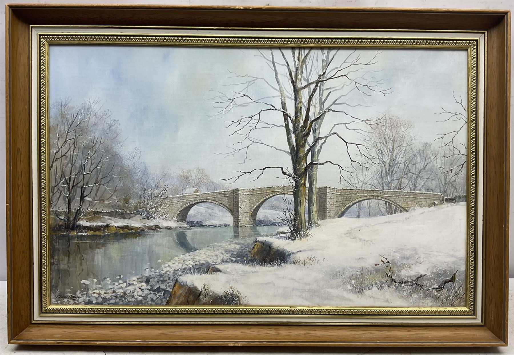 Stephen Maude (British 1919-): 'Barden Bridge Wharfedale in Winter', acrylic on canvas board signed, titled signed and dated 1983, 42cm x 67cm