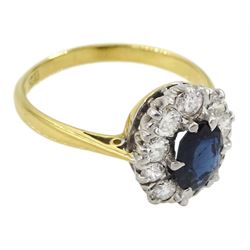 18ct gold oval sapphire and round brilliant cut diamond cluster ring, stamped  18ct Plat, total diamond weight approx 0.55 carat
