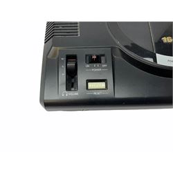 1990s Sega Megadrive 16bit games console with five games comprising Sonic the Hedgehog, Fifa International Soccer, Mickey Mouse Castle of Illusion, MicroMachines 2 Turbo Tournament and 1994 Lillehammer Winter Olympics, boxed with instructions