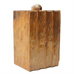 Rabbitman - pair of adzed oak bookends, each carved as a set of four books, with carved rabbit signature, by Peter Heap of Wetwang