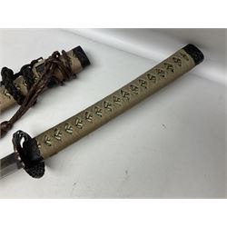 Reproduction Scottish officers basket hilt broad sword, the brass basket pierced with heart-shaped motifs lined with red lining, together with a reproduction Japanese Katana sword, longest L110cm