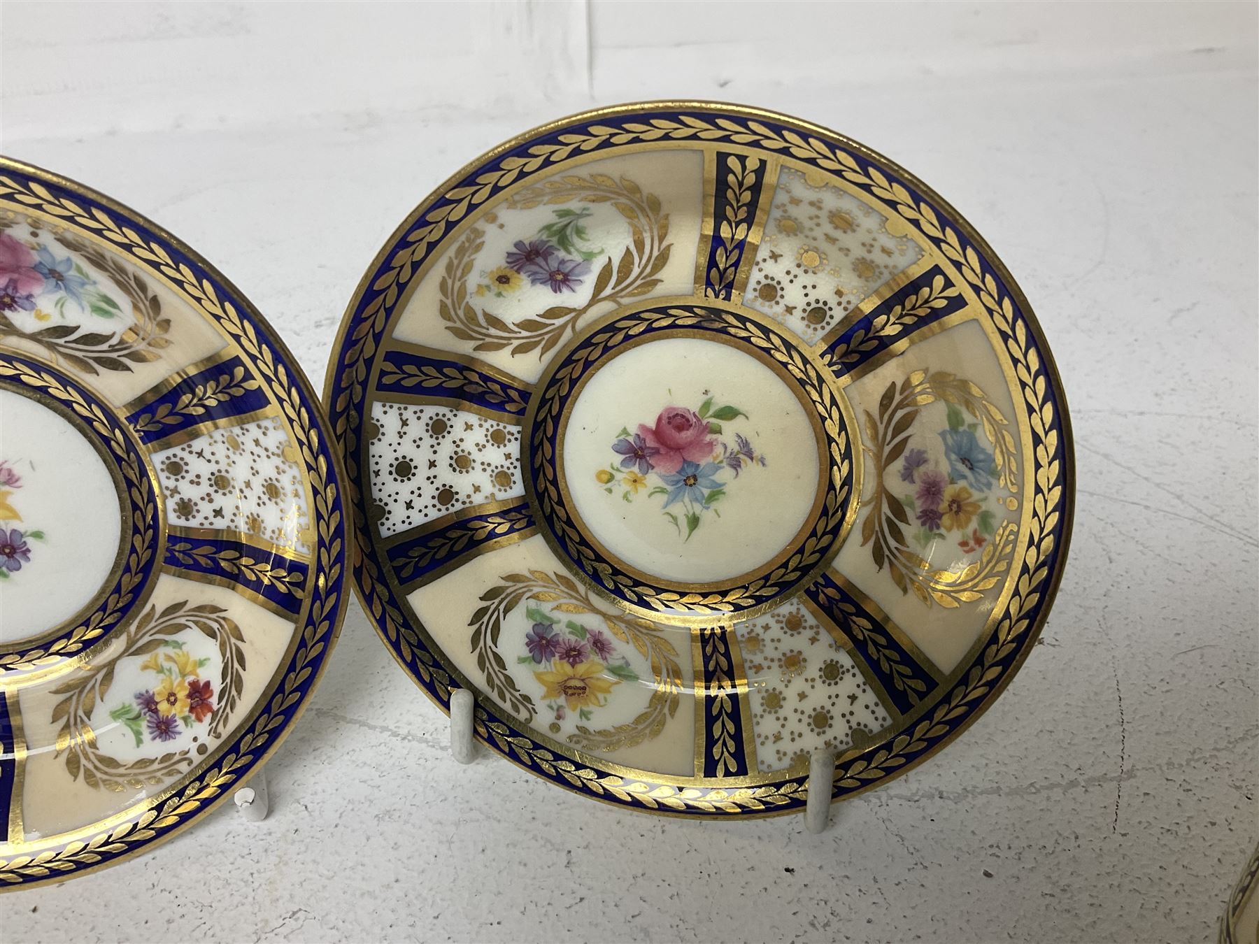 Paragon thee coffee cans and saucers, painted in gilt and colours with flowers, Paragon set of six coffee cups and saucers, 'Reproduction of Service accepted by Her Majesty Queen on her visit to the potteries, with three matching saucers