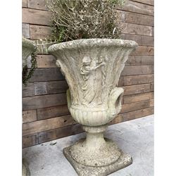 Set of four Victorian design cast stone Grecian urns, tapering form cast with figures and handles, square plinth bases