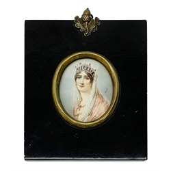 20th century oval portrait miniature upon ivory, depicting a Joséphine Bonaparte, signed René, within an ebonised rectangular frame with acorn mounted suspension ring, miniature H6cm, frame H13cm. 