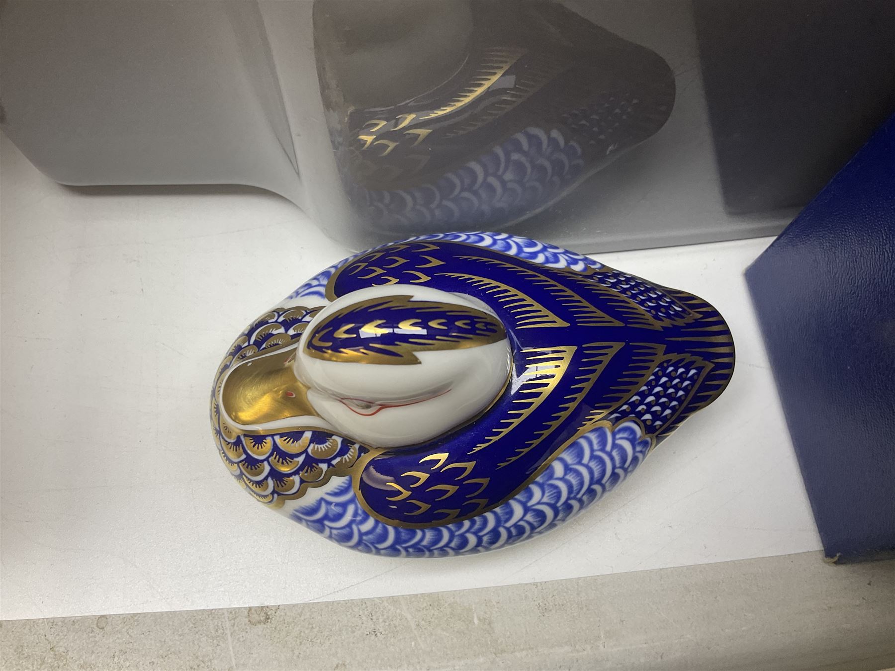 Royal Crown Derby duck, together with Emma Bridgewater mug, Coalport wall plaque and other ceramics and glassware etc, in three boxes 