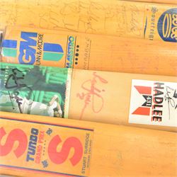 Signed International cricket memorabilia, comprising Alan Donald signed Kookaburra Commander cricket ball, wide brimmed hat signed by Darren Sammy and other West Indies players and a collection of signed miniature cricket bats, each with signatures of International cricket players including Brian Lara, Grant Flower, Richard Hadlee, Zimbabwe vs Rest of World 1993, South Africa vs Presidents VI 1994, Eastern Province South Africa 1992 and South Africa Touring Side Scarborough 1994