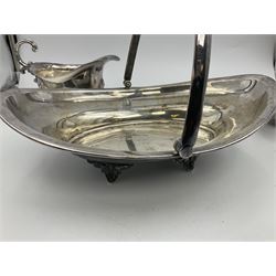 Silver plated seven bar toast rack by Mappin & Webb, together with other silver plated items including pair of bottle coasters, swing handled baskets and two sauce boats