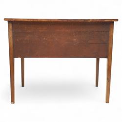 Early 19th-century mahogany kneehole desk with ebony stringing, rectangular top above an arrangement of one long and four short drawers, each with brass knob handles, raised on square tapered legs