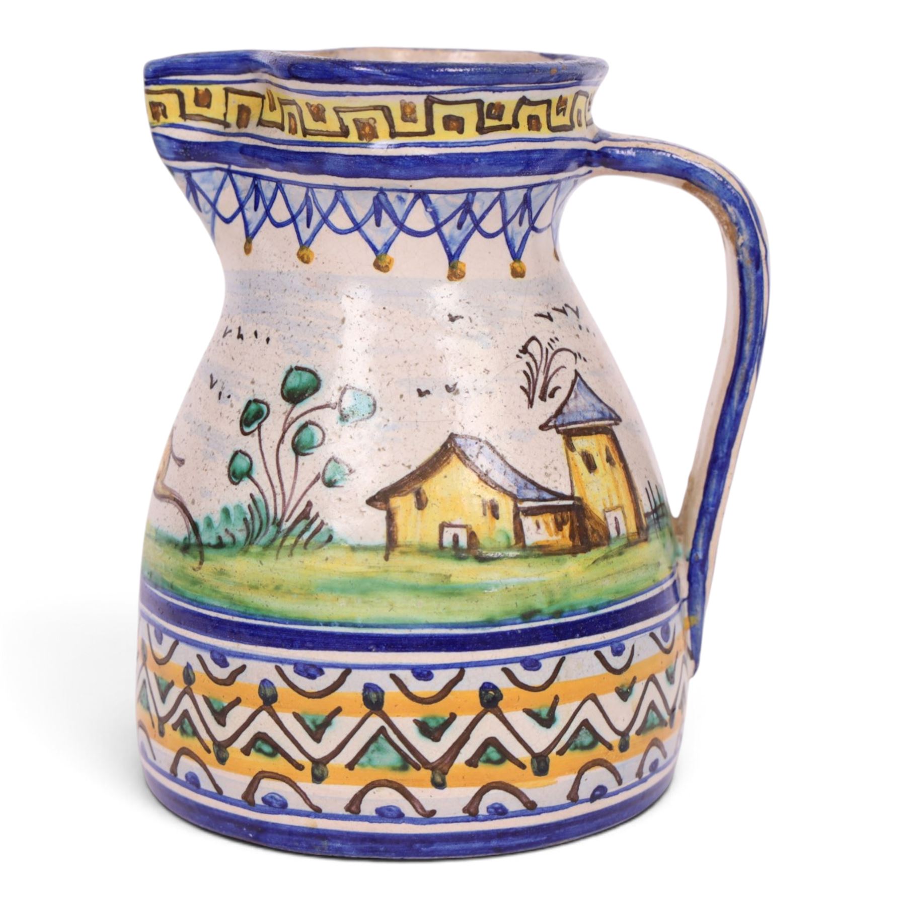 19th century Spanish faience jug with polychrome tin glaze decorated depicting a hunter and dog in a country scene within a geometric boarder, H18cm