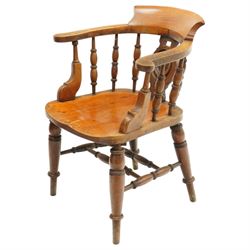Victorian mahogany Captains chair, central roundel splat flanked by turned spindles, on turned supports united by double H-stretcher