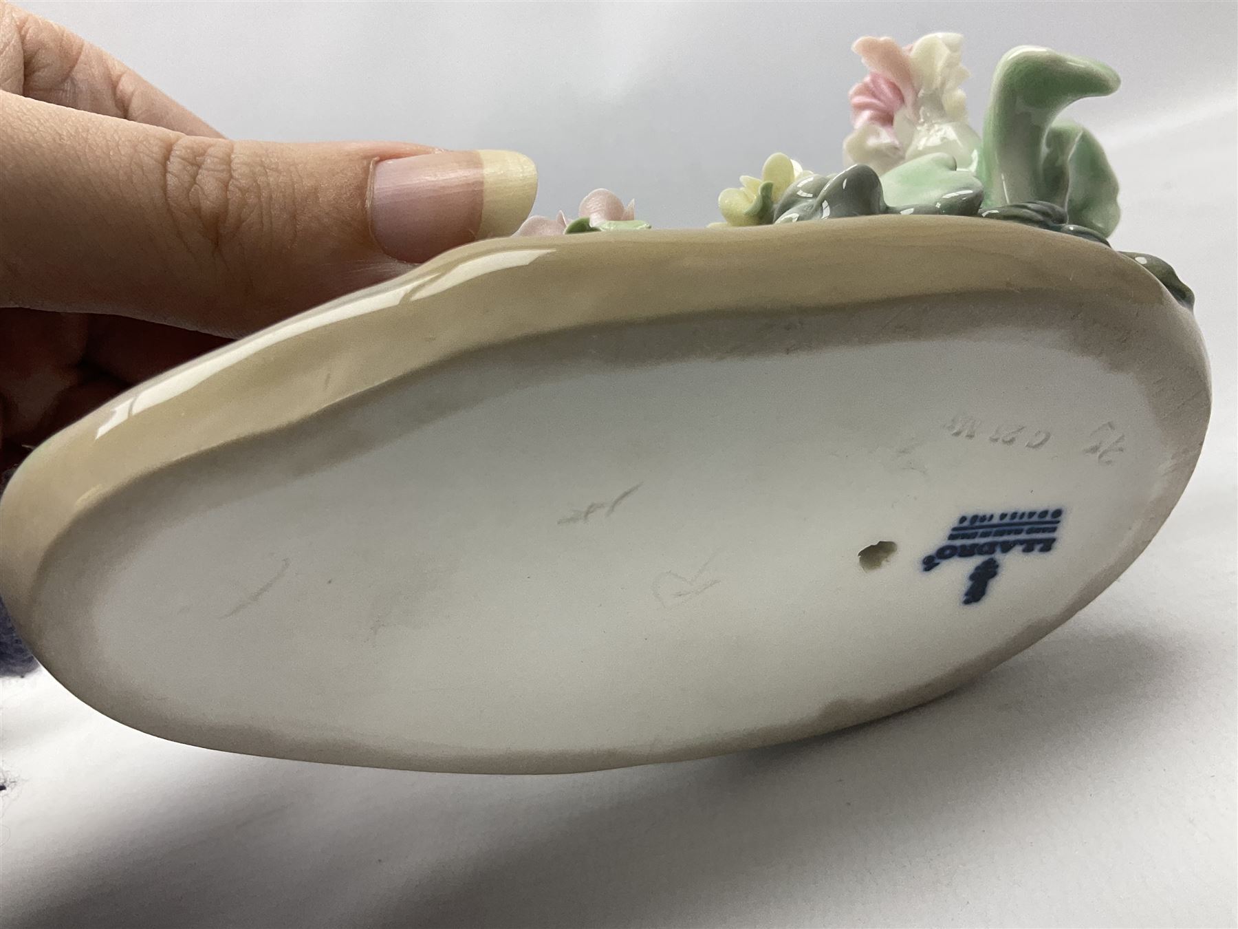 Six Lladro figures, comprising Naughty Dog no 4982, Best Friend 7620 and My Buddy no 7609, Kitty Confrontation no 1442, It Wasn't Me no 7672 and Rabbit Eating no 4772, three with original boxes, largest example H22cm