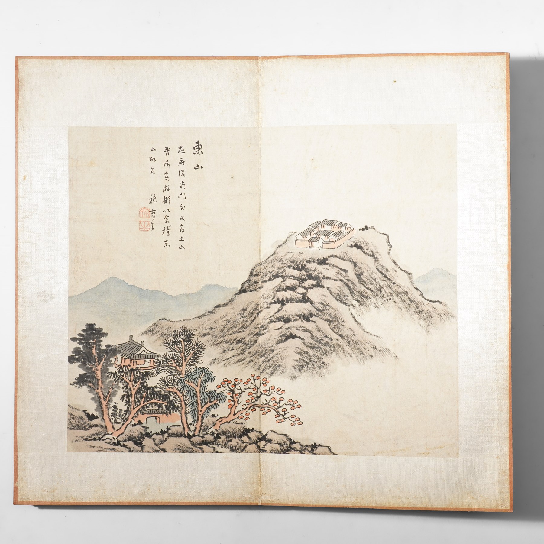 Chinese fold out book, comprising 12 hand-coloured woodblock landscapes each bearing inscription and artists seal  