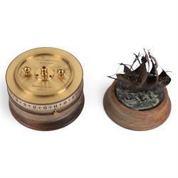 Limited edition Charles Frodsham of London for The St. James's House Company 'Mariners World Clock', the cylindrical brass and wooden body with two silvered annular chapter rings displaying the time and world location, surmounted by silver model of the Golden Hinde upon marble plinth, no. 240/500, H24cm 