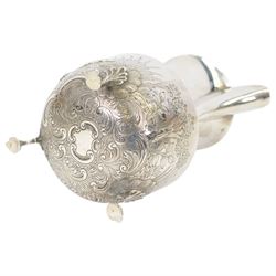 1920s silver hot water pot, with chased and repousse decoration to body depicting pheasants and rabbits in a countryside setting, with Bakelite type handle and finial, upon three palmette mounted feet, hallmarked S Blanckensee & Son Ltd, Birmingham 1928, H22cm