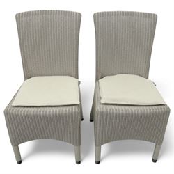 Neptune – Sheldrake limed oak extendable dining table and eight Havan loom chairs, the oval top in limed oak finish with four additional leaves extending the table to seat up to ten (Extends to cm), raised on turned legs with two additional centre supports, the matching Havan loom chairs finished in grey with cream upholstered seat covers (H 95cm, W 47cm, D 55cm)