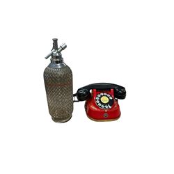 Glass soda siphon, together with Belgian Bell Telephone Company dial-up telephone, by MFG