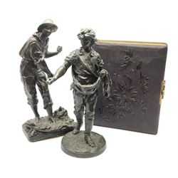 Two spelter figures, one with base titled 'Moisson', each approximately H33cm, together with a Victorian leather bound photograph album (blank)