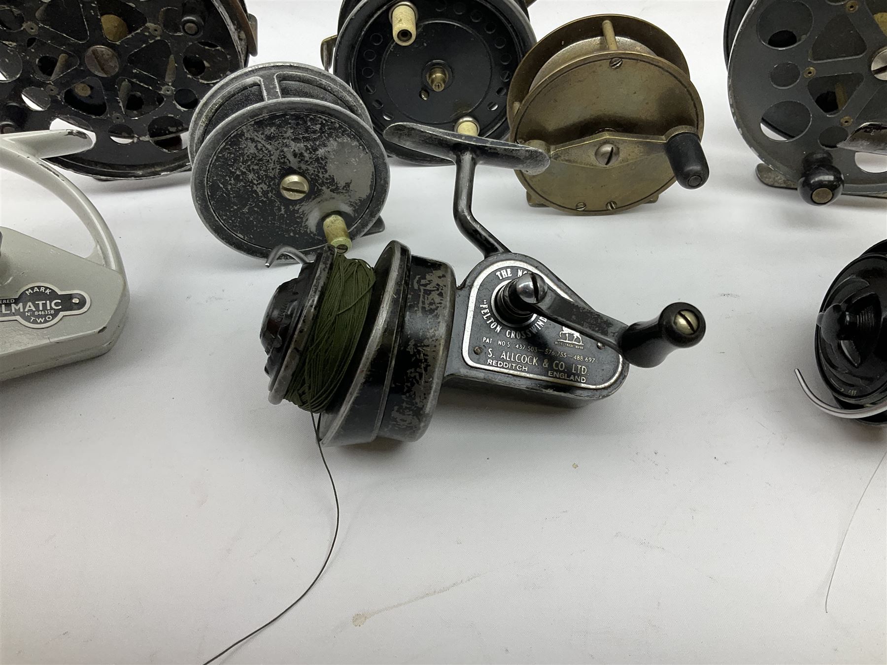 Eight fishing reels including S. Allcock & Co Ltd 'Easicast', 'Black Knight', 'Duco', 'Delmatic', 'The No.2 Felton Crosswind', etc (5)