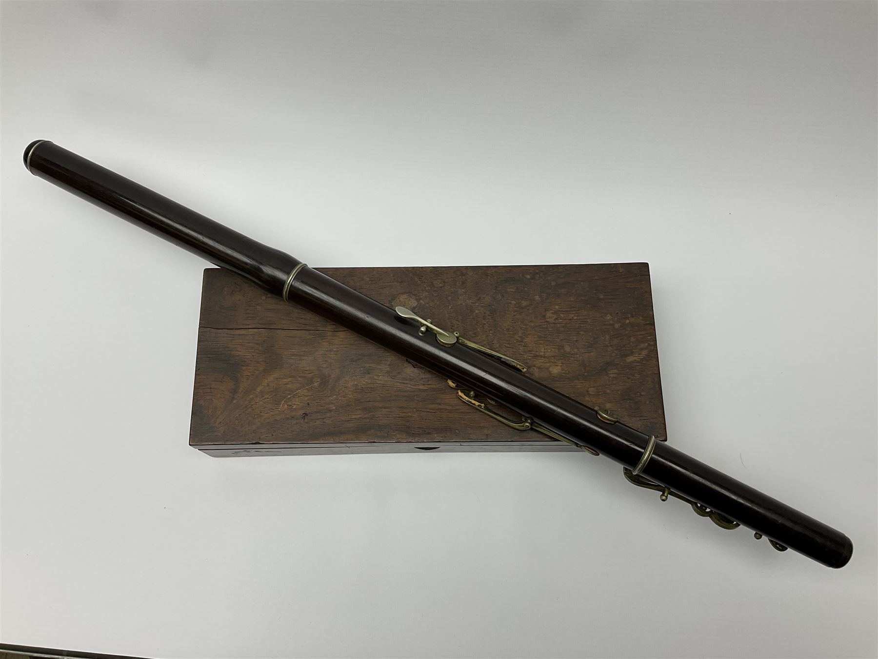 Victorian rosewood and nickel three-section flute by A. Buffet Paris, impressed 'S.R. Chappell 52 New Bond Street London 1851' L62cm; in fitted rosewood box