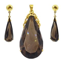 14ct gold pear cut smokey quartz pendant, stamped 585 with pair of similar 14ct gold pendant stud earrings