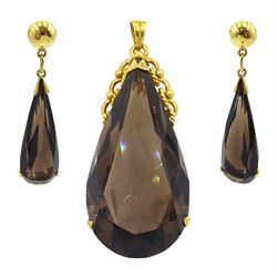 14ct gold pear cut smokey quartz pendant, stamped 585 with pair of similar 14ct gold pendant stud earrings