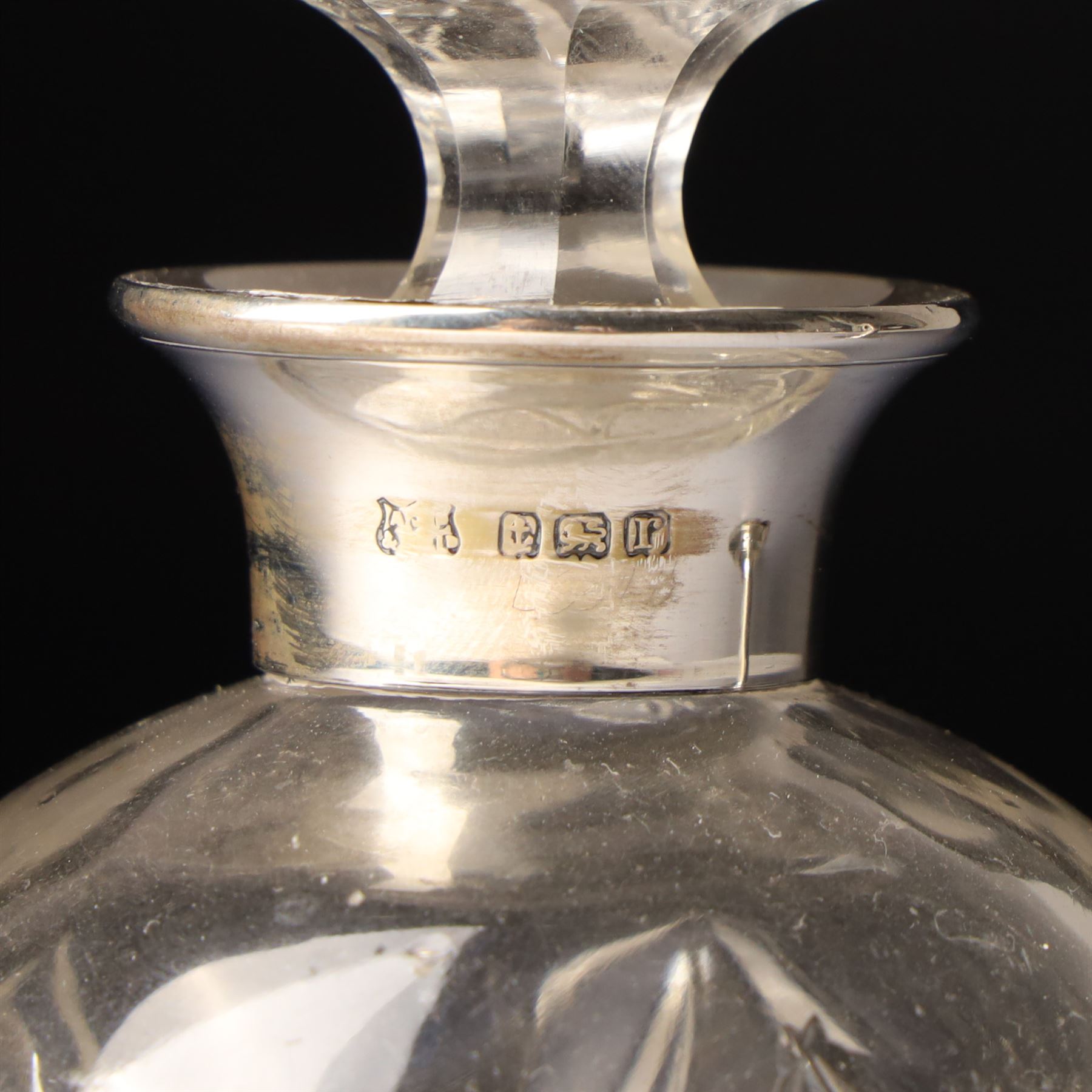 Silver upright photograph frame, aperture size 14cm x 9.5cm Birmingham 1919, pair of glass scent flasks with silver collars H16cm , two others, two dressing table jars with silver covers and a silver candlesticks