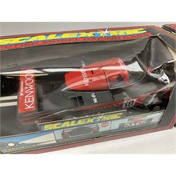 Scalextric by Hornby - seven cars comprising C486 Porsche 962 Kenwood, C467 Tyrrell 018, C601 Mercedes Sonax, C699 Mercedes Promarket #5, C468 Sauber Mercedes, C2104 Mini Yellow No.56 and C2002 Audi A4; all boxed (7)